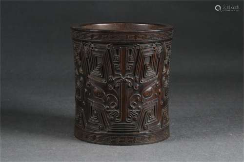 A Carved Zitan Wood Beast Patterned Brush Pot