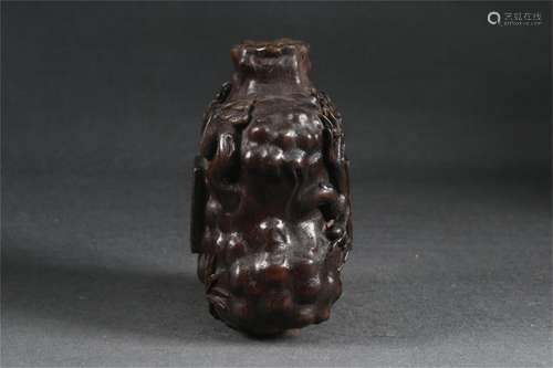 A Carved Agarwood Vase with Tree Pattern