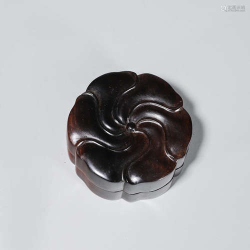 A flower shaped rosewood pomander