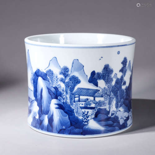 A blue and white landscape porcelain brush pot