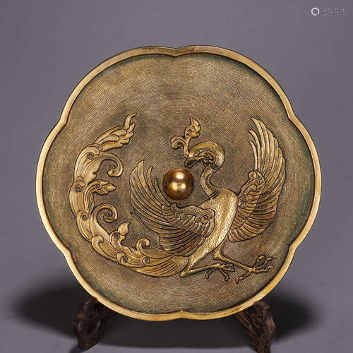 A phoenix bird gilding copper mirror