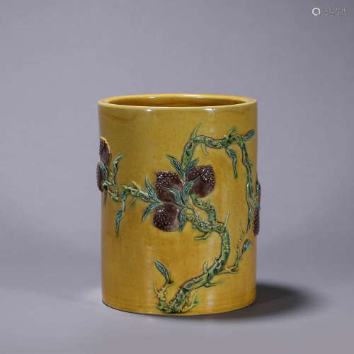 A tri-colored bat and peach porcelain brush pot