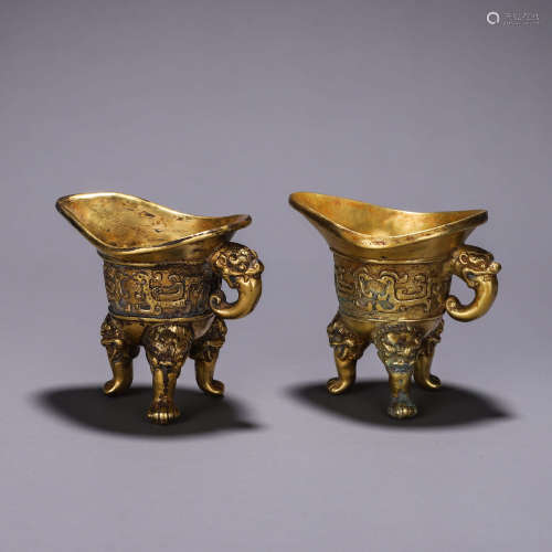A pair of dragon and phoenix gilding copper jue cups