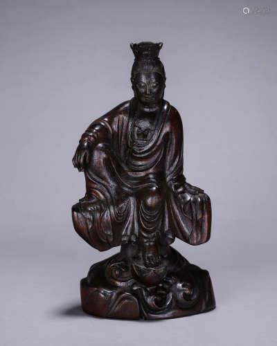 An aloeswood carved Guanyin statue