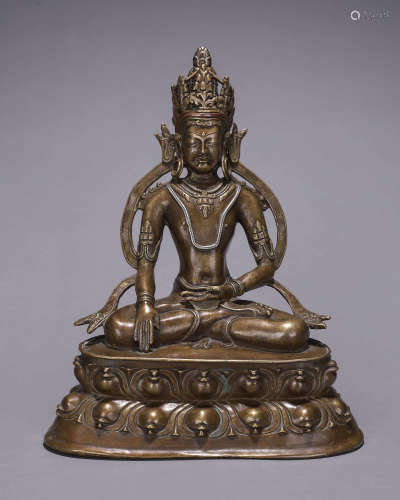 A copper silver-inlaid Sakyamuni buddha statue