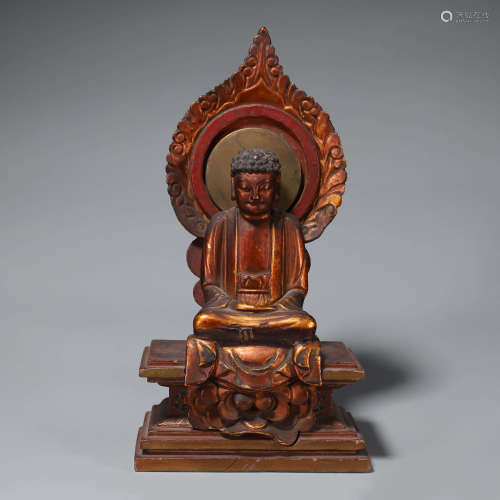 A gilt wood Sakyamuni statuette