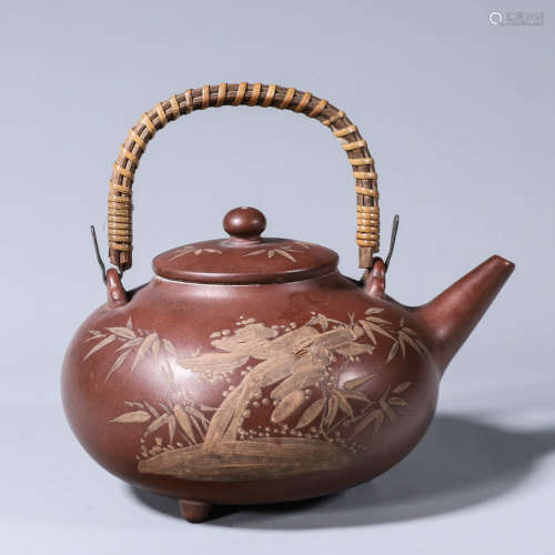 A painted zisha ceramic loop-handled pot