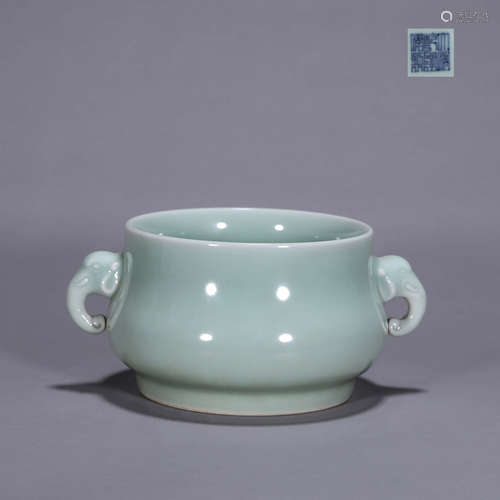 A celadon glazed porcelain censer with elephant head shaped ...