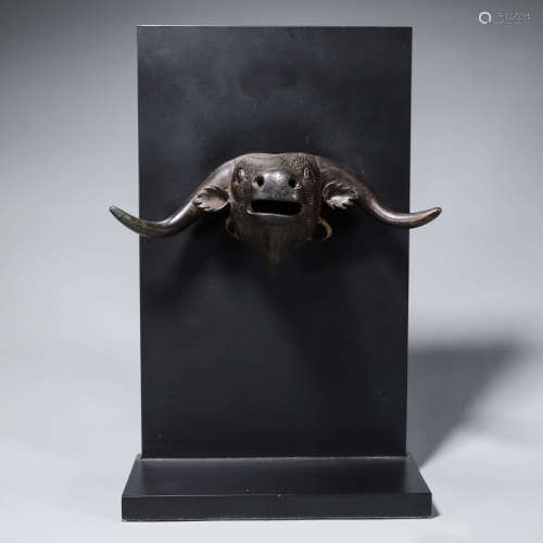 A copper bull head ornament