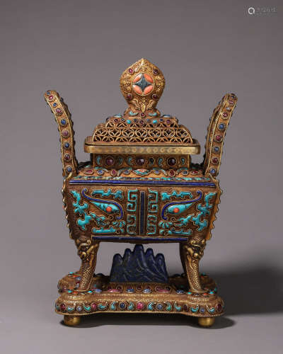 A turquoise-inlaid taotie patterned gilding copper pot