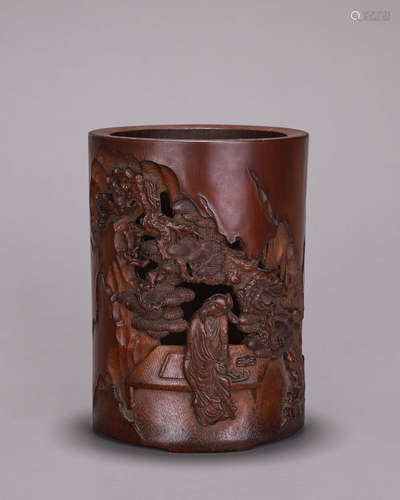 A figure carved bamboo brush pot