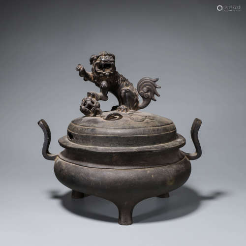 A double-eared copper lion incense burner