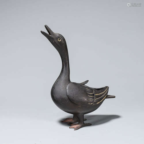 A copper duck incense burner