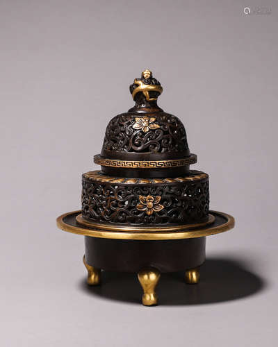 A hollowed out flower gilding copper censer