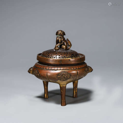 A double-eared three-legged copper lion incense burner