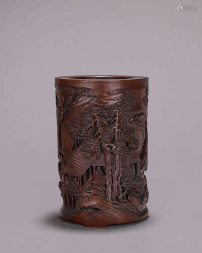 A figure carved bamboo brush pot