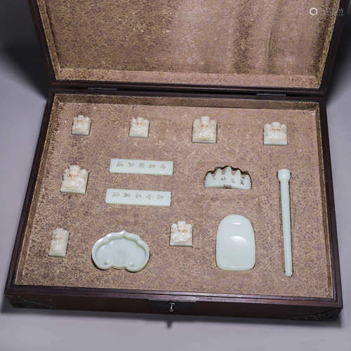 A group of dragon patterned Hetian jade study sets