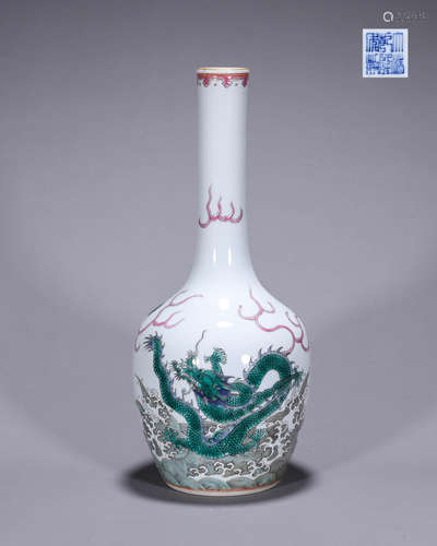 A famille rose cloud and dragon porcelain vase