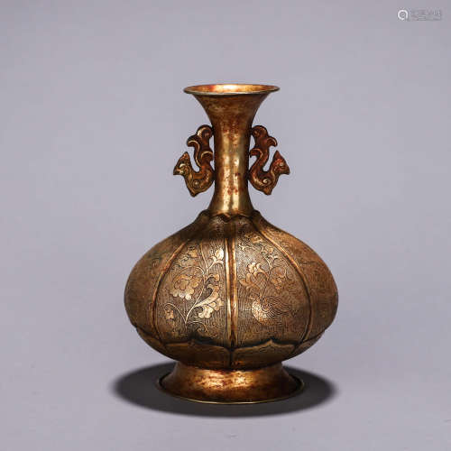 A bird and flower gilding copper vase with phoenix shaped ea...