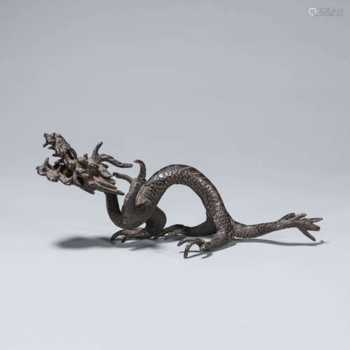 A copper dragon ornament