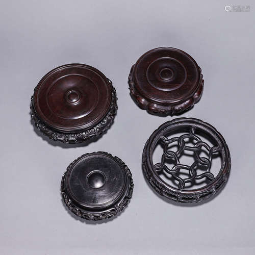 A set of 4 red sandalwood pedestals