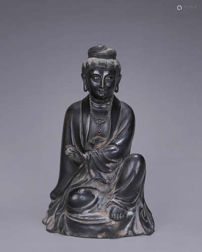 A copper Guanyin bodhisattva statue