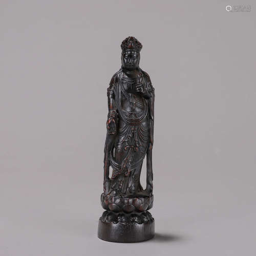 An aloeswood Guanyin bodhisattva statuette