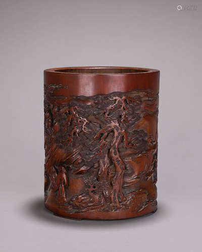 A figure carved bamboo brush pot