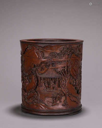 A figure carved bamboo brush pot