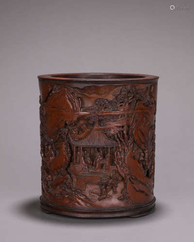 A figure carved bamboo brush pot