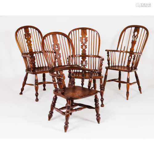 A set of four different chairs Windsor style