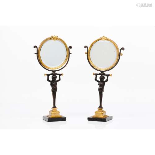 A pair of table top mirrors