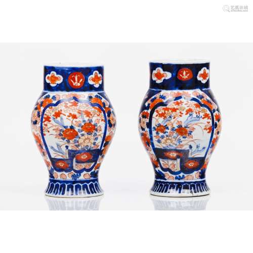 A pair of vases