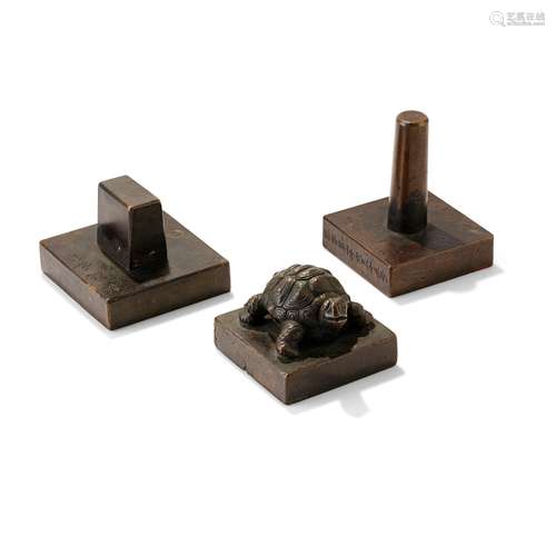 GROUP OF THREE BRONZE SQUARE SEALS