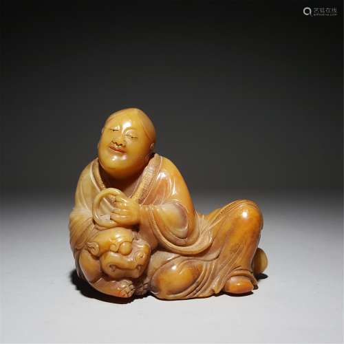 A SOAPSTONE FIGURAL CARVING