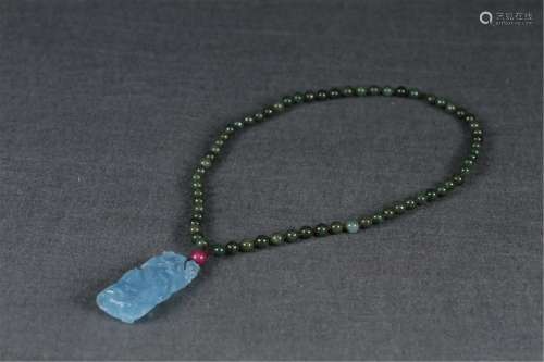 A NECKLACE WITH SEA BLUE HARD-STONE DRAGON PENDANT