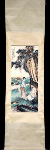 A CHINESE PAINTING OF FIGURES UNDER PINE