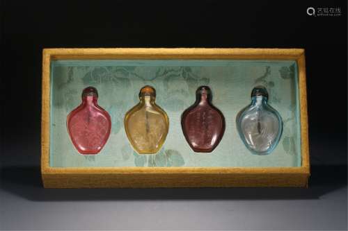 GROUP OF INSCRIBED GLASS SNUFF BOTTLES