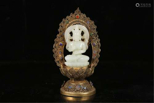 A JADE CARVED SEATED BUDDHA AND GILDING PEDESTAL
