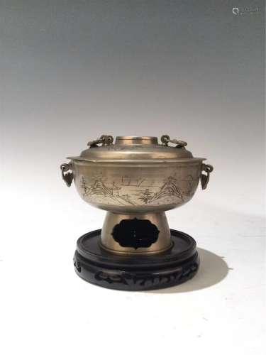 A CHINESE CARVED BRONZE HOT POT