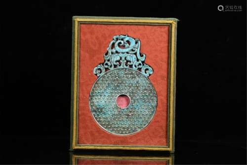 A HOLLOW CARVED TURQUOISE DECORATION