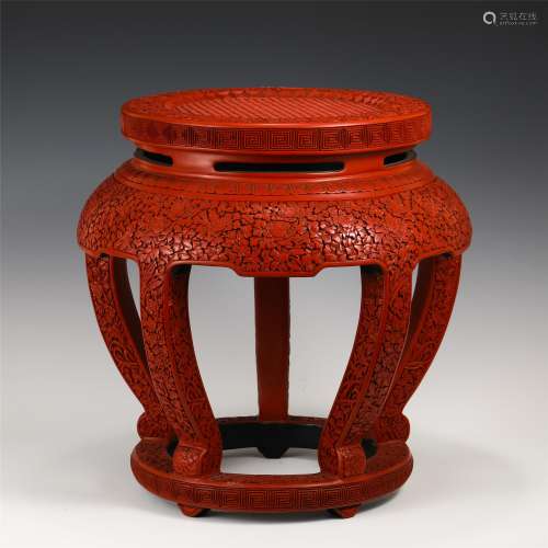 A CARVED RED LACQUER STOOL