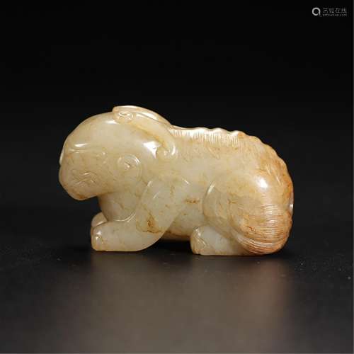 A MYTHICAL BEAST JADE CARVING