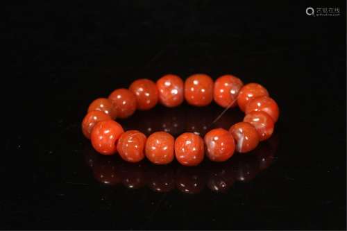 A STRING OF NANJIANG RED AGATE BRACELET