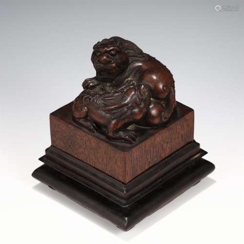 A CHENXIANG WOOD CARVED BEAST SEAL