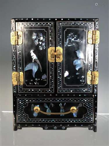 A CHINESE LACQUER INLAID MOTHER OF PEARL WOODEN CABI…