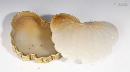 A BUTTERFLY SHAPED JADE BOX AND COVER