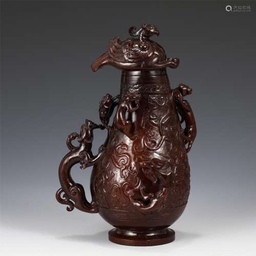 A JADE CARVED BEAST VASE AND COVER