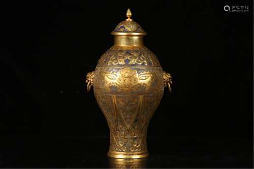 A GILDING BRONZE DOUBLE-HANDLED JAR AND COVER
