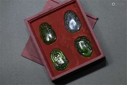 GROUP OF GLASS CARVED FASTING PENDANTS